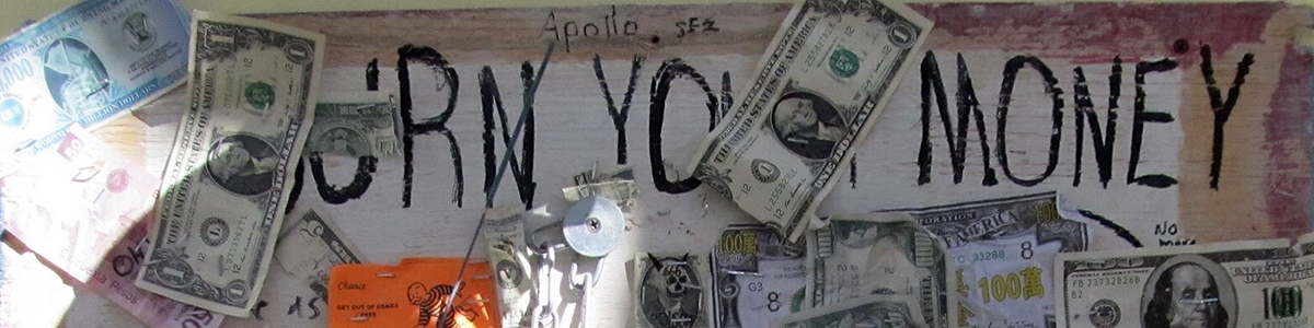 Photo of a bulletin board with money on it